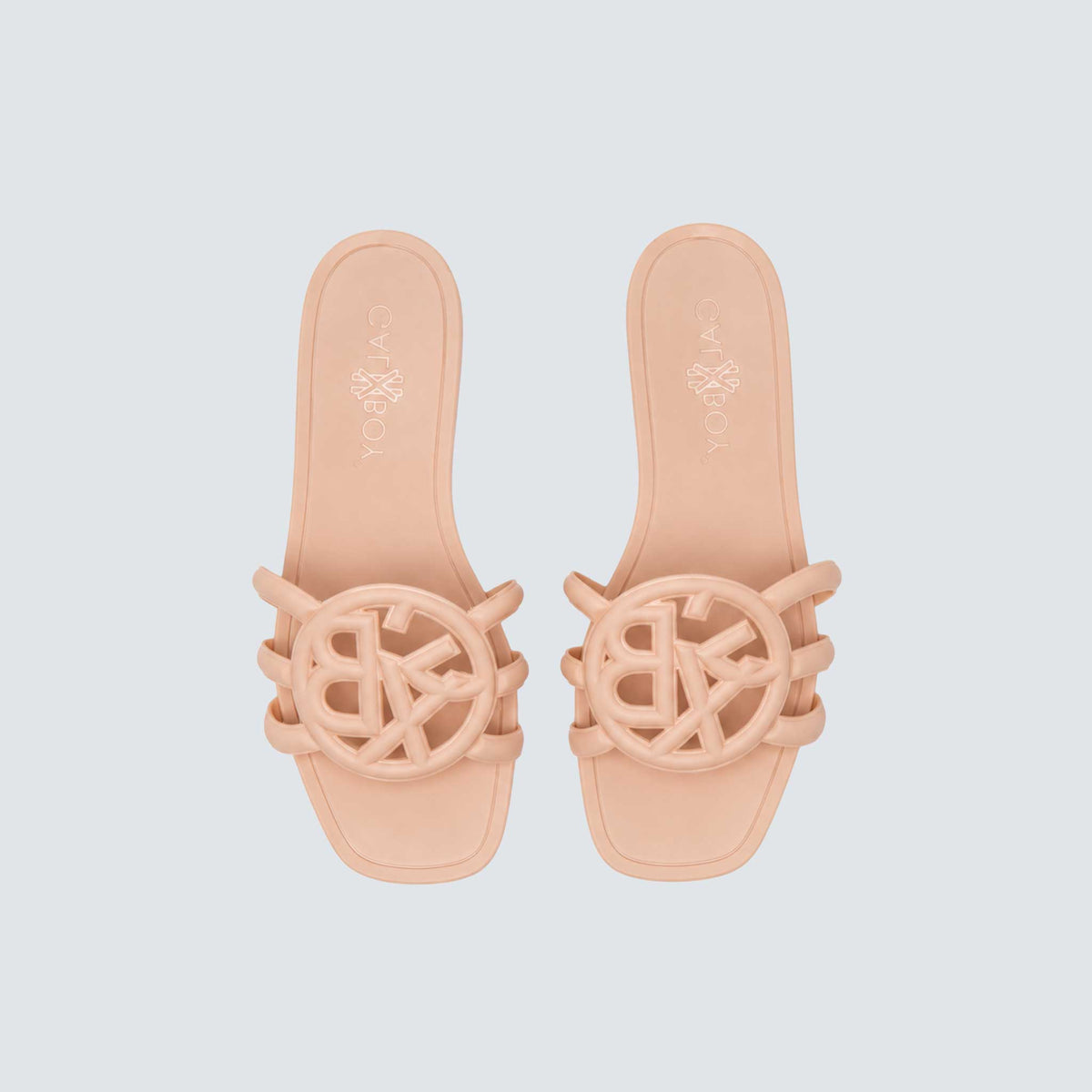 GALXBOY GXB Island Sandal in beige, top view of pair with monogram uppers.
