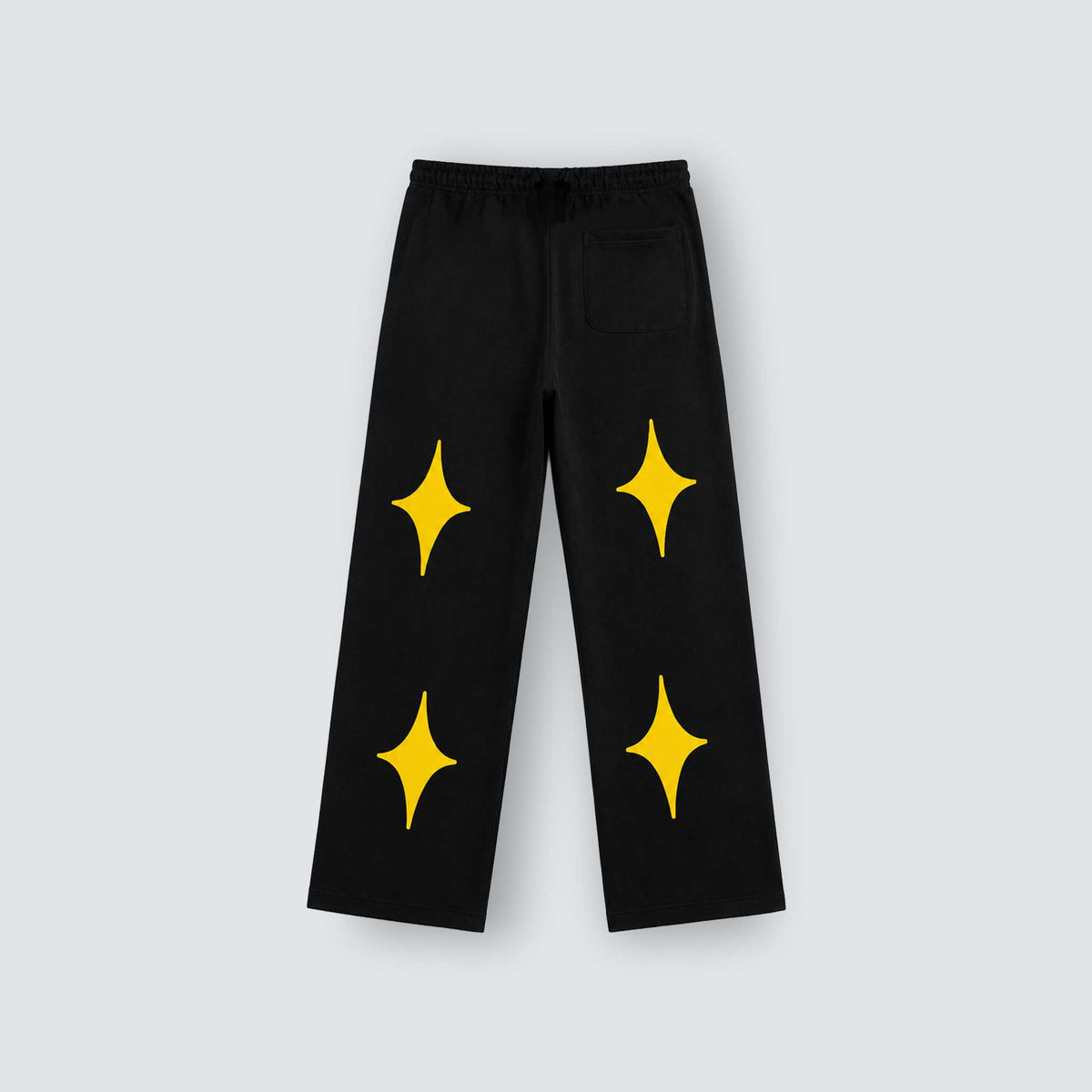 GALXBOY Angel Star Pants in black, flat back view with yellow stars.